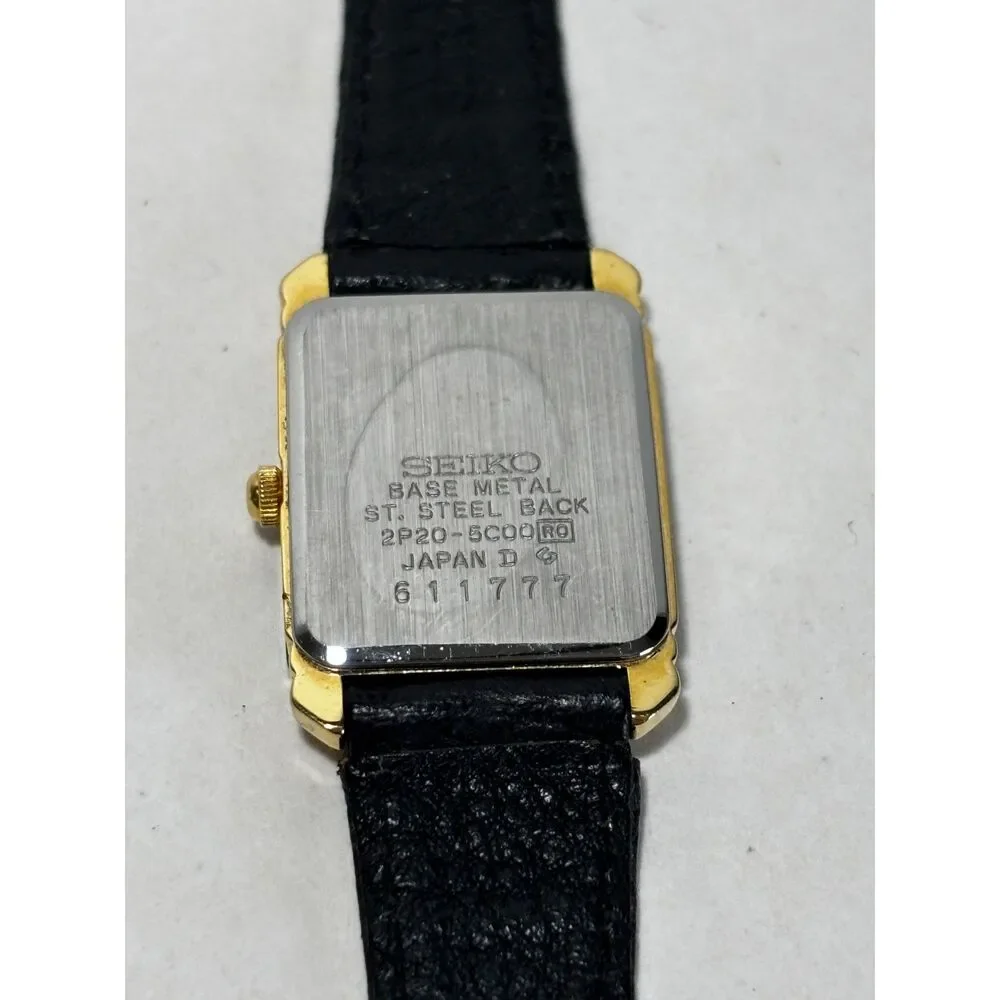 Vintage Seiko 2P20-5000 gold tone women's watch with black leather, working